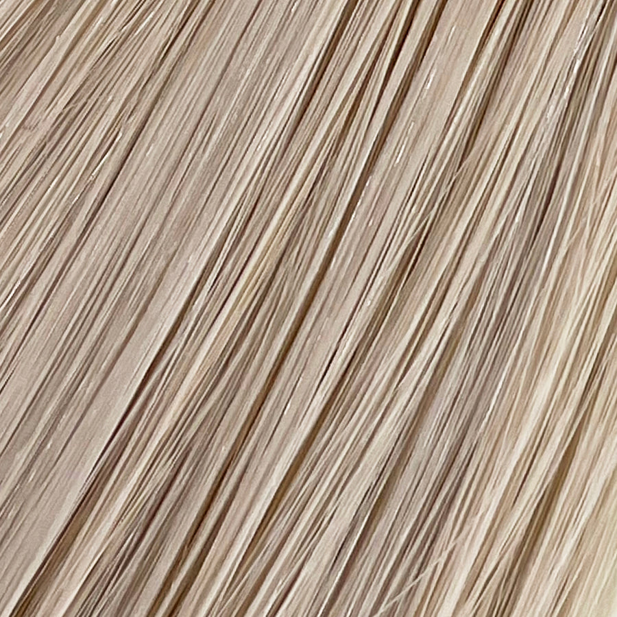 Pearl is our ashy blonde, bright but opalescent. A hard exterior with a soft demeanor. The world is your oyster.  Stylist lingo: Ash level 10 Harloc Tape-In Extensions are made from ethically sourced, premium, Remy Slavic Hair. These reusable hair extensions can be used to add length, volume, chemical-free colour, or to correct or enhance a haircut. Available in 16 beautiful shades. Combine multiple colours to create a custom colour blend and perfect match.