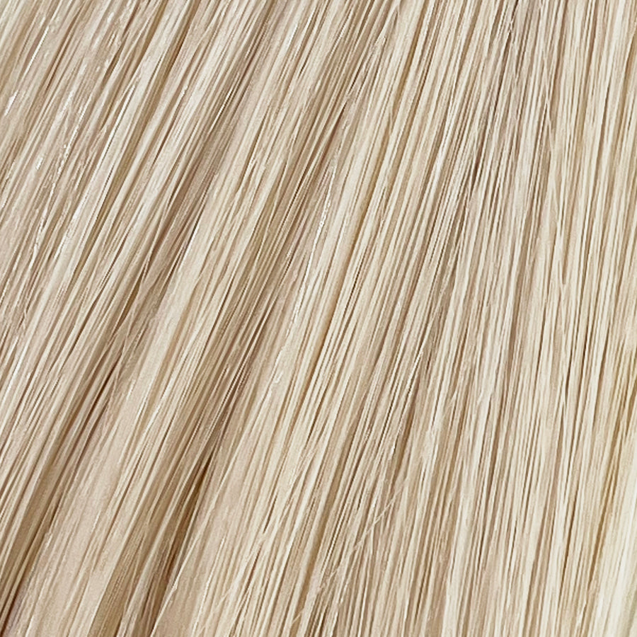 Porcelain is one of our brightest blondes with neutral undertones. If you  discover dragons on your doorstep...we warned you! #motherofdragons  Stylist lingo: Natural/beige level 10 Harloc Tape-In Extensions are made from ethically sourced, premium, Remy Slavic Hair. These reusable hair extensions can be used to add length, volume, chemical-free colour, or to correct or enhance a haircut. Available in 16 beautiful shades. Combine multiple colours to create a custom colour blend and perfect match.