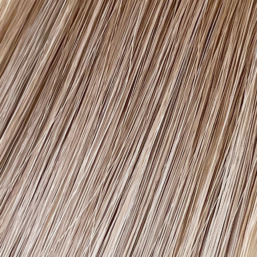 Soleil Sand is our golden blonde blend cascading from a Sand root.  Stylist lingo: Natural rooted level 8 blended into natural/gold dimensional levels 8 & 10 The Harloc Ponytail Extension is our clip-in ponytail that is made from ethically sourced, Remy Slavic hair. It is a quick way to instantly add length and volume to your ponytail and it comes in two lengths, 18-20” and 20-24”. It comes with a velcro base and clip to secure the ponytail.  Available in 10 of our beautiful shades.
