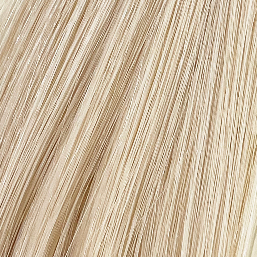 Moonstone is our lightest and brightest blonde with slight golden undertones. C'mon Barbie, let's go party! Stylist lingo: Natural level 10 Harloc Tape-In Extensions are made from ethically sourced, premium, Remy Slavic Hair. These reusable hair extensions can be used to add length, volume, chemical-free colour, or to correct or enhance a haircut. Available in 16 beautiful shades. Combine multiple colours to create a custom colour blend and perfect match.