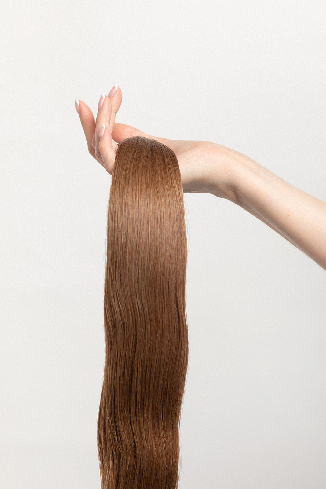 Cedarwood is our light brown, with warm undertones. Take a trip into our candy land, and be sure to stop by the river of chocolate - just to the left of the gumdrop forest.   Stylist lingo: Gold level 7   Harloc Tape-In Extensions are made from ethically sourced, premium, Remy Slavic Hair. These reusable hair extensions can be used to add length, volume, chemical-free color, or to correct or enhance a haircut. 