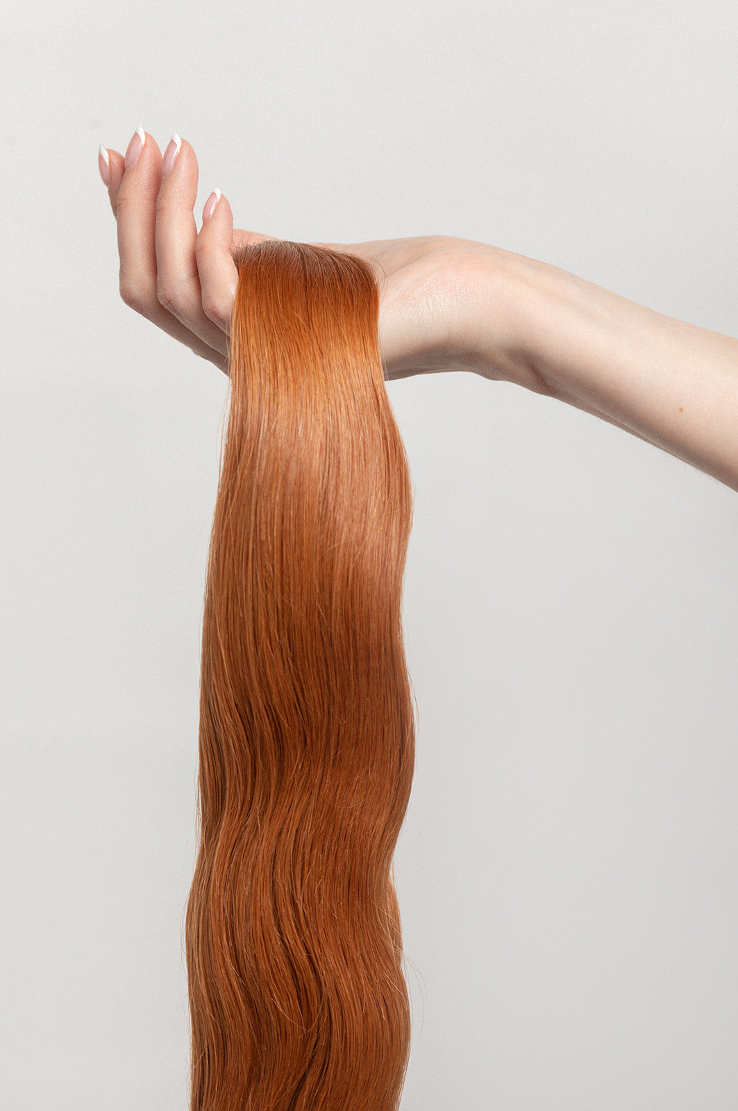 Sandalwood is our brightest copper tone. You want Thingamabobs? You’ll have plenty. Release your inner Ariel.  Stylist lingo: Copper/gold level 7 Harloc Tape-In Extensions are made from ethically sourced, premium, Remy Slavic Hair. These reusable hair extensions can be used to add length, volume, chemical-free colour, or to correct or enhance a haircut. Available in 16 beautiful shades. Combine multiple colours to create a custom colour blend and perfect match.