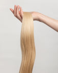 Oat is our soft buttery blonde. You ain’t no run of the mill. Feel your oats.  Stylist lingo: Natural/gold level 9  Harloc Tape-In Extensions are made from ethically sourced, premium, Remy Slavic Hair. These reusable hair extensions can be used to add length, volume, chemical-free colour, or to correct or enhance a haircut. Available in 16 beautiful shades. Combine multiple colours to create a custom colour blend and perfect match.