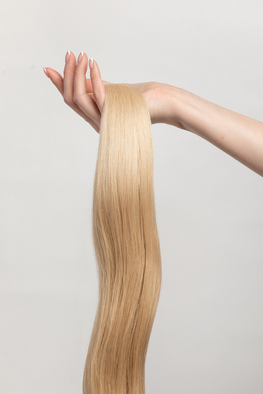 Oat is our soft buttery blonde. You ain’t no run of the mill. Feel your oats.  Stylist lingo: Natural/gold level 9  Harloc Tape-In Extensions are made from ethically sourced, premium, Remy Slavic Hair. These reusable hair extensions can be used to add length, volume, chemical-free colour, or to correct or enhance a haircut. Available in 16 beautiful shades. Combine multiple colours to create a custom colour blend and perfect match.
