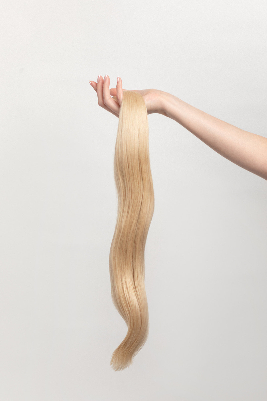 Oat is our soft buttery blonde. You ain’t no run of the mill. Feel your oats.  Stylist lingo: Natural/gold level 9  Harloc Tape-In Extensions are made from ethically sourced, premium, Remy Slavic Hair. These reusable hair extensions can be used to add length, volume, chemical-free colour, or to correct or enhance a haircut. Available in 16 beautiful shades. Combine multiple colours to create a custom colour blend and perfect match.