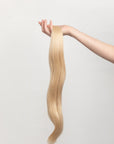 Oat is our soft buttery blonde. You ain’t no run of the mill. Feel your oats.  Stylist lingo: Natural/gold level 9  Harloc Tape-In Extensions are made from ethically sourced, premium, Remy Slavic Hair. These reusable hair extensions can be used to add length, volume, chemical-free colour, or to correct or enhance a haircut. Available in 16 beautiful shades. Combine multiple colours to create a custom colour blend and perfect match.