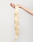 Porcelain is one of our brightest blondes with neutral undertones. Stylist lingo: Natural/beige level 10 The Harloc Ponytail Extension is our clip-in ponytail that is made from ethically sourced, Remy Slavic hair. It is a quick way to instantly add length and volume to your ponytail and it comes in two lengths, 18-20” and 20-24”. It comes with a velcro base and clip to secure the ponytail. Available in 10 of our beautiful shades.