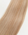 Honey is our dimensional blonde with warm undertones.  Hidden Harloc Clip-In Extensions are made from ethically sourced, Remy Slavic hair. They come with 5 seamless silicone wefts to ensure an undetectable result that is comfortable to wear. Whether you are looking to add volume or length, a stunning look for a special event, or just want to look and feel gorgeous. Available in 10 of our beautiful shades.