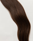 Sage is our medium brown, with golden undertones. This sage doesn’t need to be burned to ward off any bad energy.   Stylist lingo: Natural level 6  Harloc Tape-In Extensions are made from ethically sourced, premium, Remy Slavic Hair. These reusable hair extensions can be used to add length, volume, chemical-free colour, or to correct or enhance a haircut. Available in 16 beautiful shades. Combine multiple colours to create a custom colour blend and perfect match.