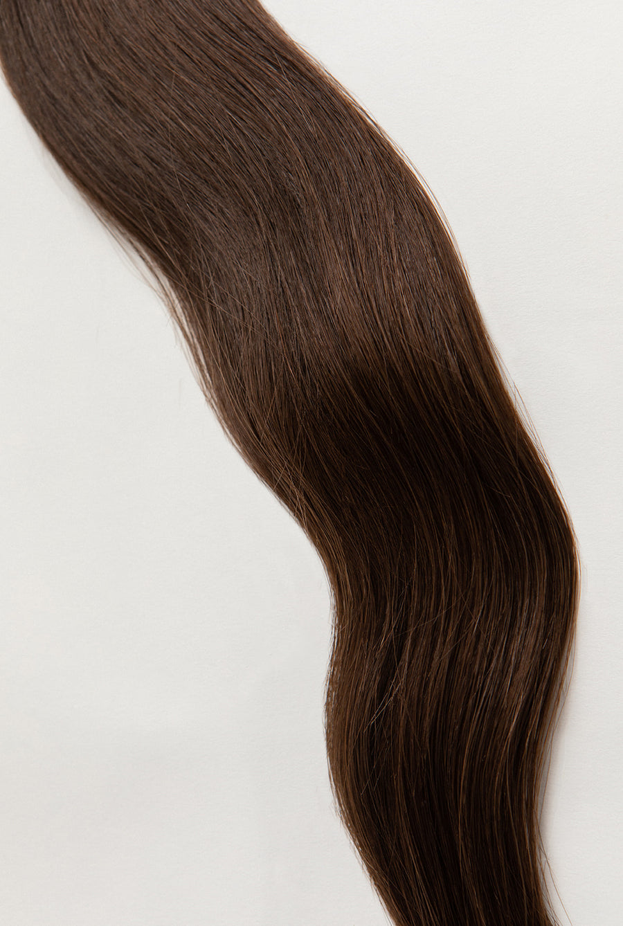 Sage is our medium brown, with golden undertones. Stylist lingo: Natural level 6 Hidden Harloc Clip-In Extensions are made from ethically sourced, Remy Slavic hair. They come with 5 seamless silicone wefts to ensure an undetectable result that is comfortable to wear. Whether you are looking to add volume or length, a stunning look for a special event, or just want to look and feel gorgeous. Available in 10 of our beautiful shades.