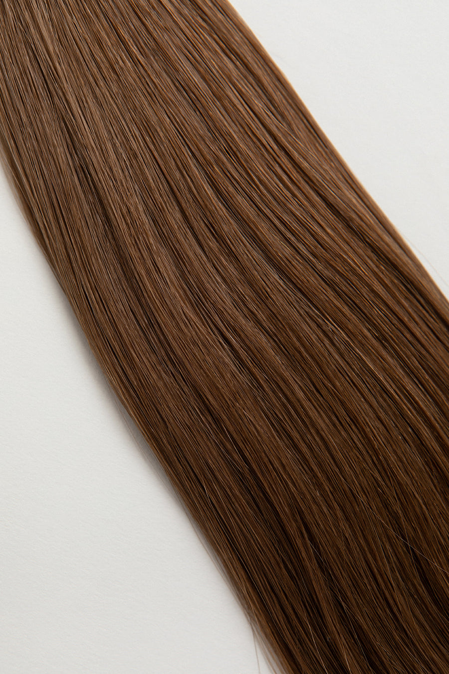 Cedarwood is our light brown, with warm undertones. Take a trip into our candy land, and be sure to stop by the river of chocolate - just to the left of the gumdrop forest. Stylist lingo: Gold level 7 Harloc Tape-In Extensions are made from ethically sourced, premium, Remy Slavic Hair. These reusable hair extensions can be used to add length, volume, chemical-free color, or to correct or enhance a haircut.