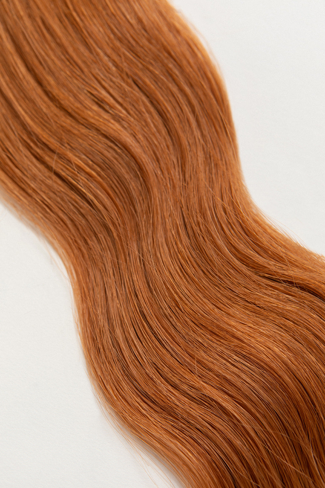 Sandalwood is our brightest copper tone. You want Thingamabobs? You’ll have plenty. Release your inner Ariel.  Stylist lingo: Copper/gold level 7 Harloc Tape-In Extensions are made from ethically sourced, premium, Remy Slavic Hair. These reusable hair extensions can be used to add length, volume, chemical-free colour, or to correct or enhance a haircut. Available in 16 beautiful shades. Combine multiple colours to create a custom colour blend and perfect match.