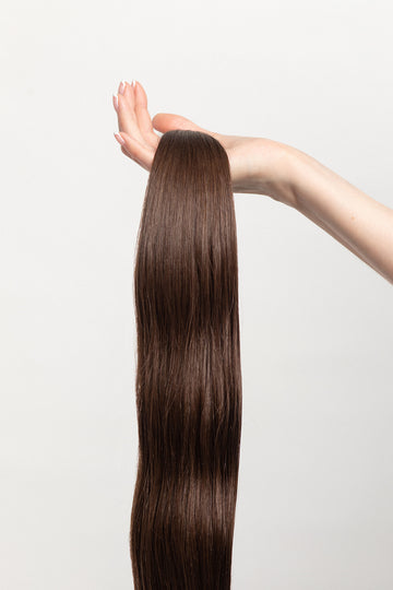 Sage is our medium brown, with golden undertones. Stylist lingo: Natural level 6 The Harloc Ponytail Extension is our clip-in ponytail that is made from ethically sourced, Remy Slavic hair. It is a quick way to instantly add length and volume to your ponytail and it comes in two lengths, 18-20” and 20-24”. It comes with a velcro base and clip to secure the ponytail. Available in 10 of our beautiful shades.