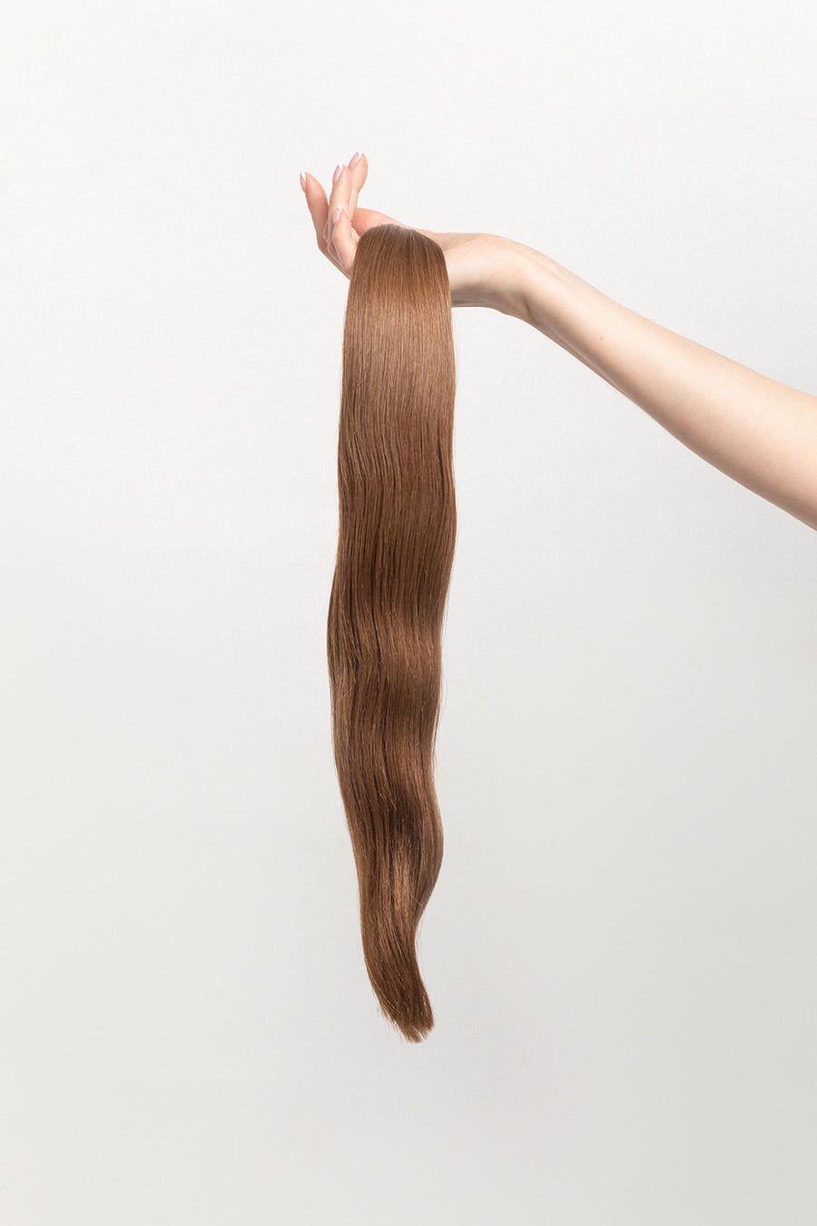 Cedarwood is our light brown, with warm undertones. Take a trip into our candy land, and be sure to stop by the river of chocolate - just to the left of the gumdrop forest. Stylist lingo: Gold level 7 Harloc Tape-In Extensions are made from ethically sourced, premium, Remy Slavic Hair. These reusable hair extensions can be used to add length, volume, chemical-free color, or to correct or enhance a haircut.